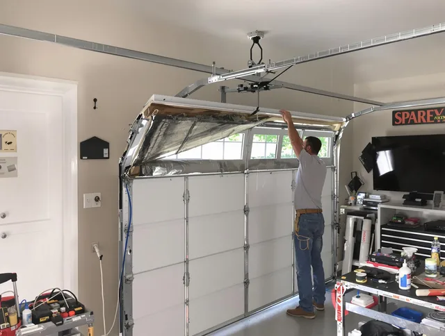Garage door section replacement by Groton Garage Door Repair in Groton